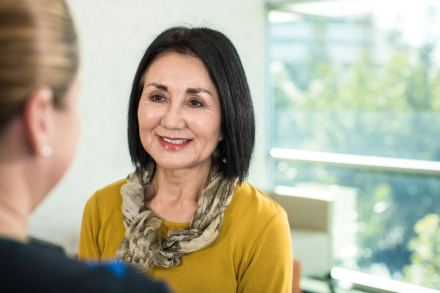 Cancer patient grinning at Icon carer.