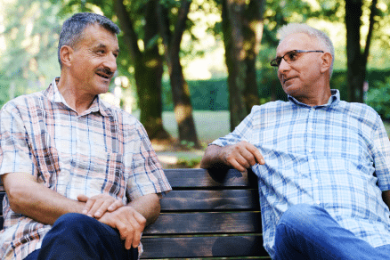 people sitting on bench