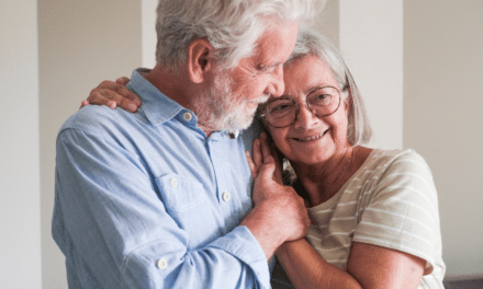 Person comforting cancer patient.