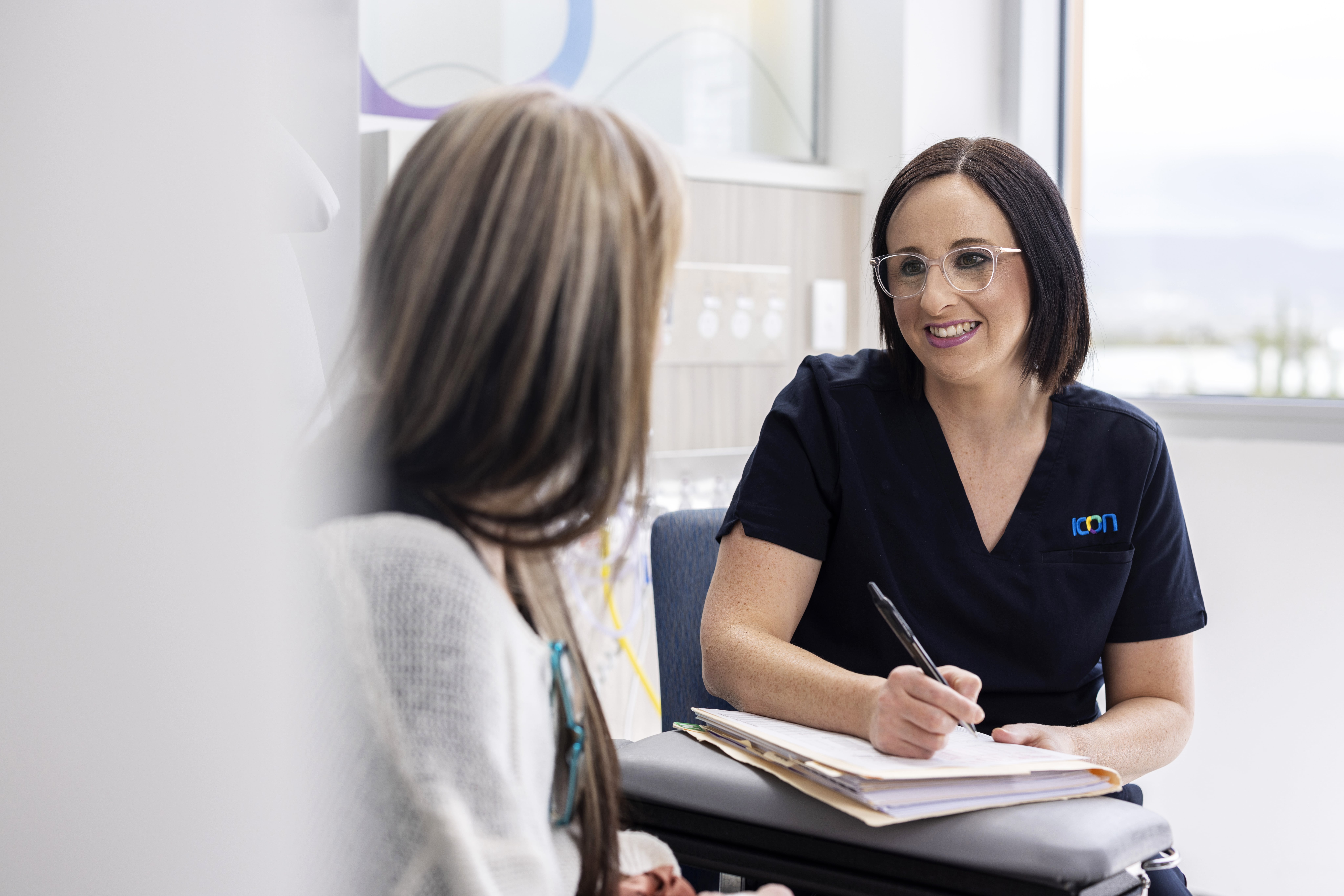 Cancer patient consulting treatment specialist