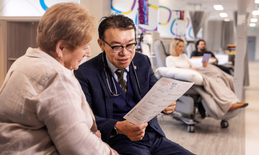 Doctor consulting cancer patient
