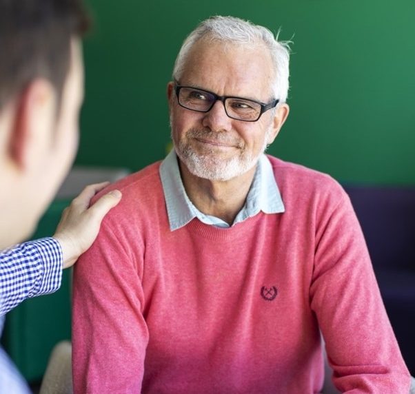 Cancer patient receiving advice on radiation treatment.