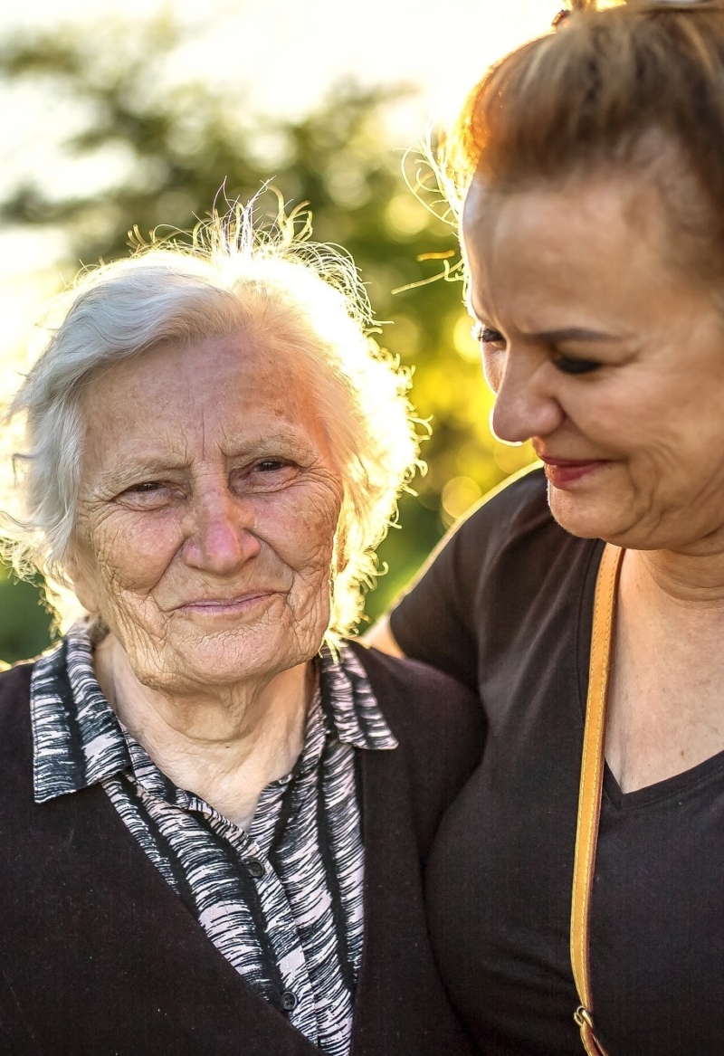 Person caring for an elderly cancer patient